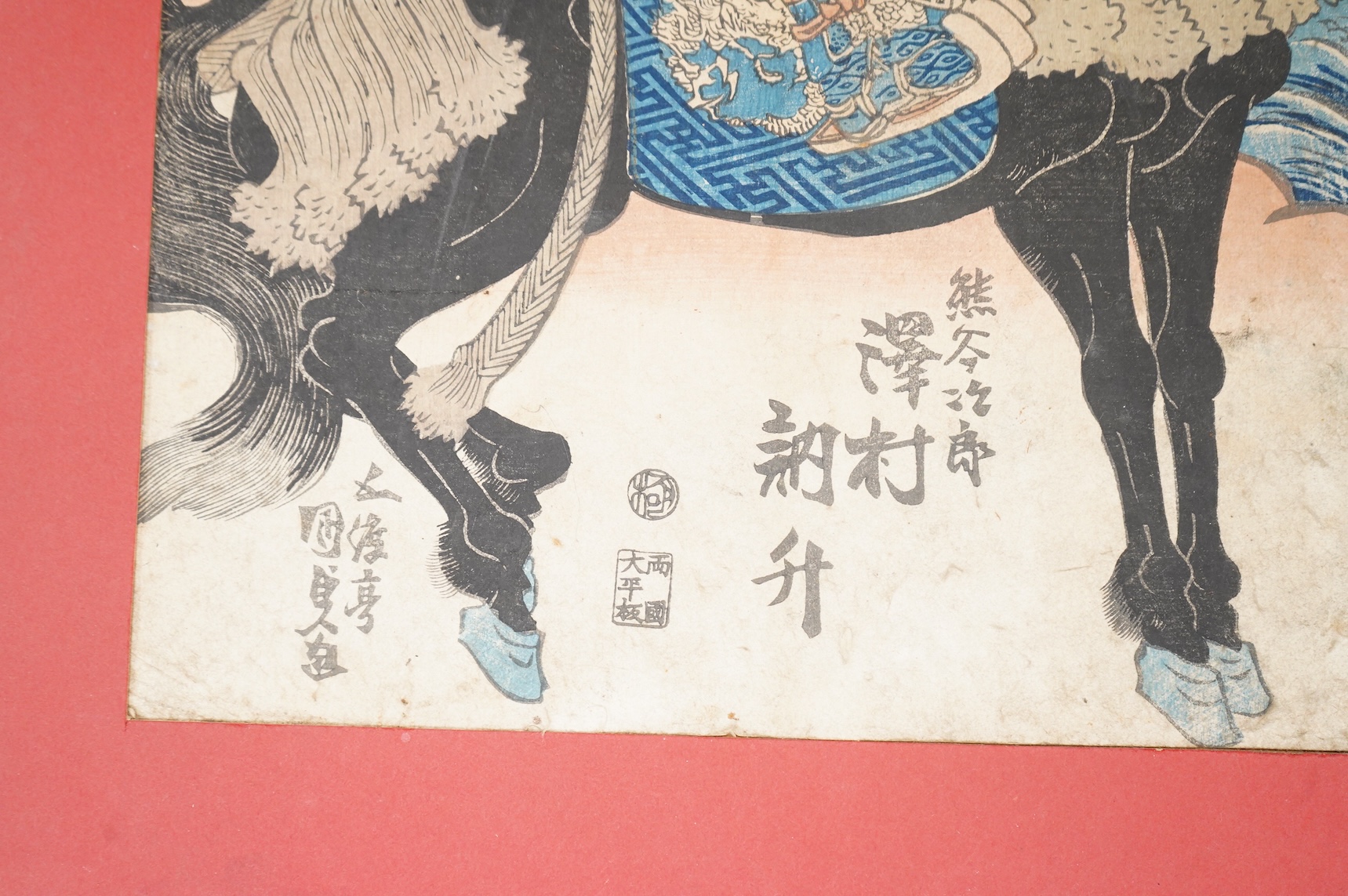 A collection of Japanese woodblock prints comprising Utagawa Kuniyoshi (1797-1861), After Utagawa Kuniyoshi, ‘Benkei on the Boat’ and another depicting a Samurai warrior on horseback, mounted, unframed, largest 35 x 24cm